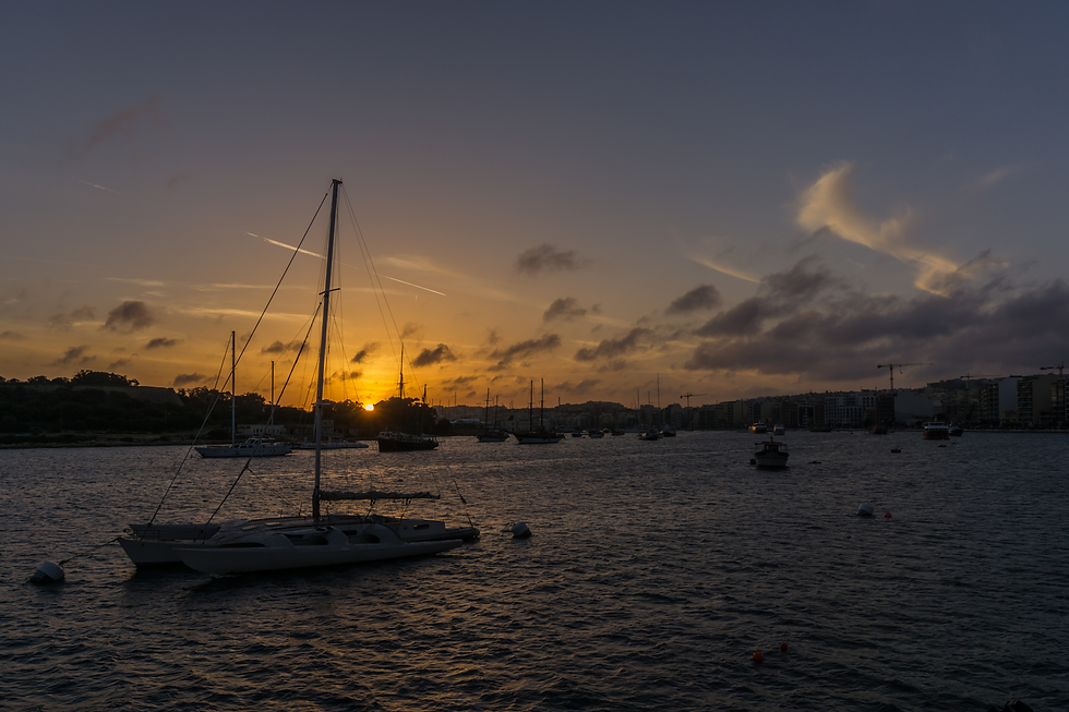 Boats at sunset in Malta