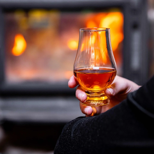 Sipping on a beer by the fire