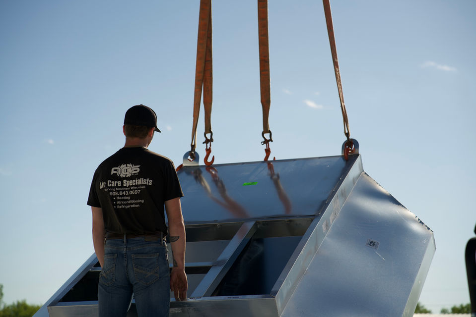 ACS Air Care Specialists doing an install