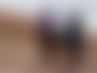 Two girls riding horses