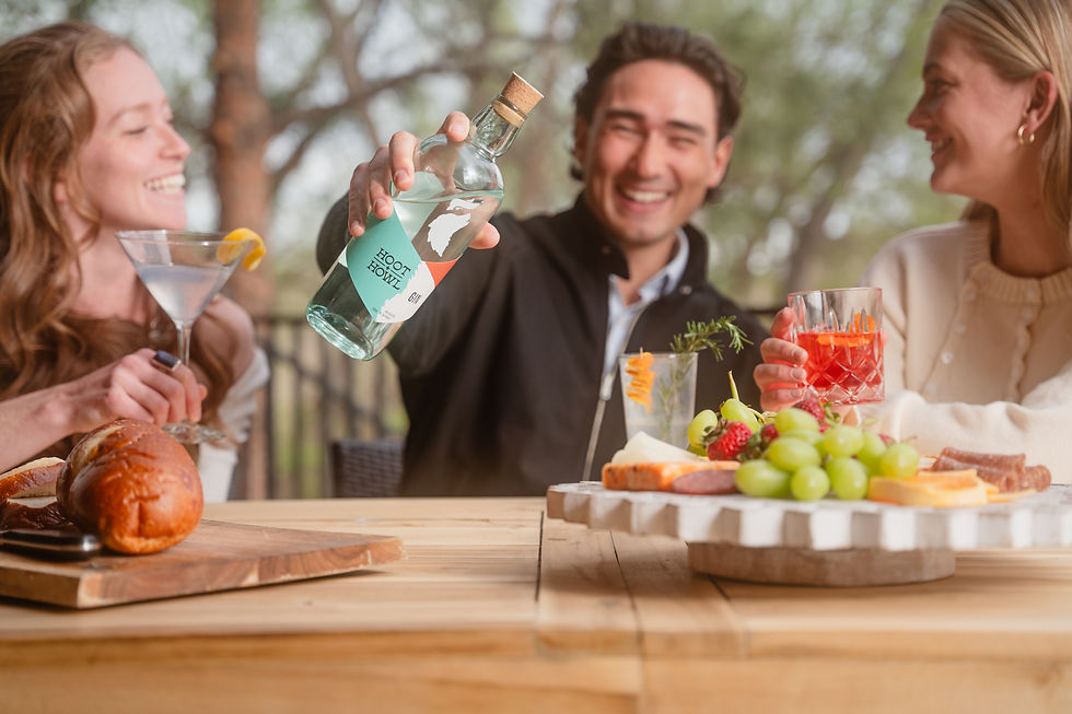 A group of friends enjoying Hoot + Howl Spirits