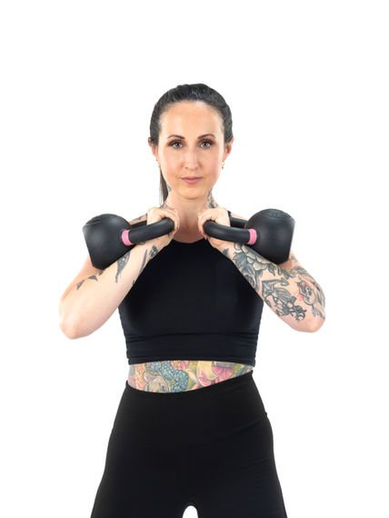 Coach Zoe Peled with kettlebells