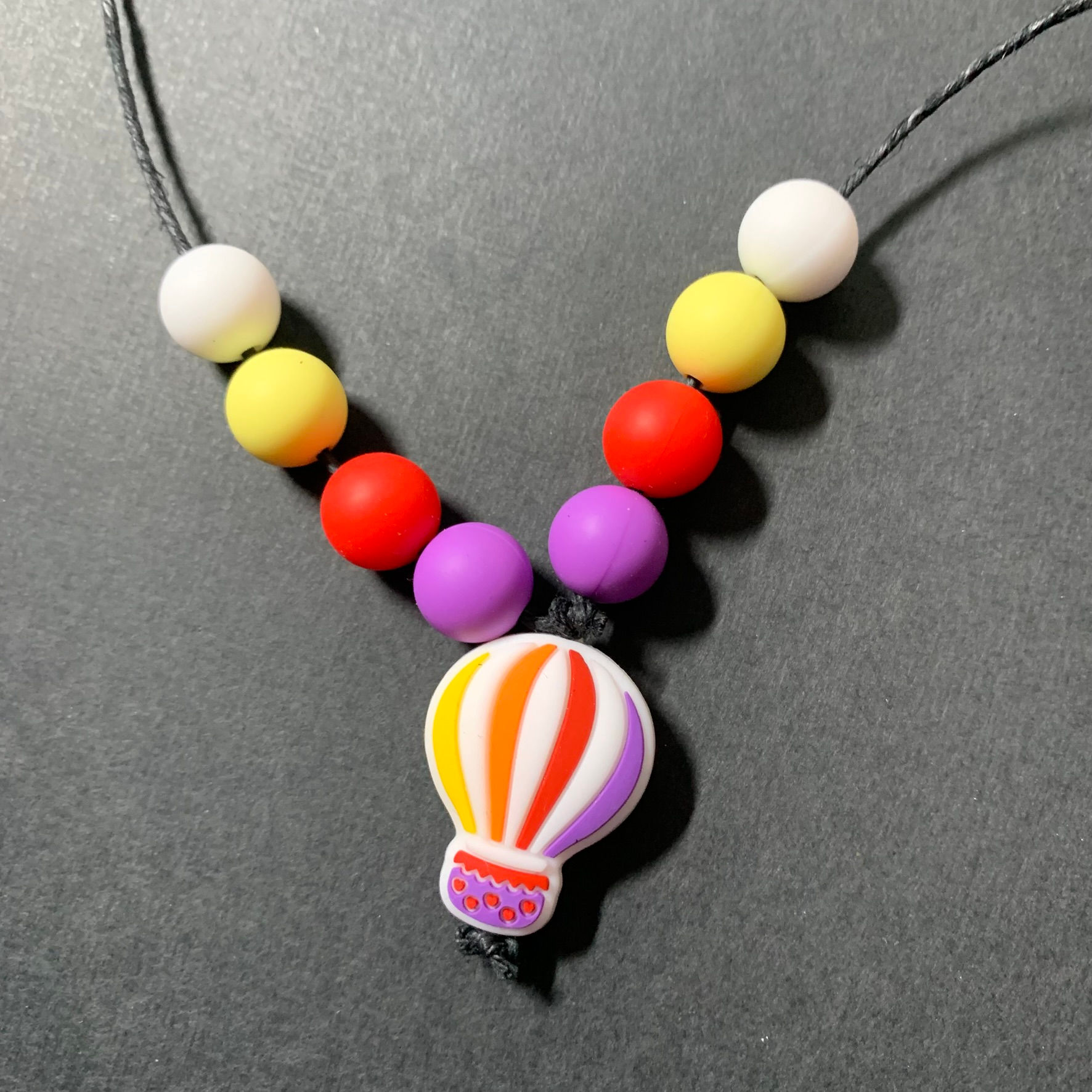 Purple hot air balloon silicone necklace