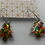 Thumbnail: Red, green and gold Christmas tree hoop earrings