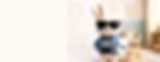 Mr Bunny character wearing sunglasses and blue jacket holding a design board in a design kids bedroom- s hoppable room design