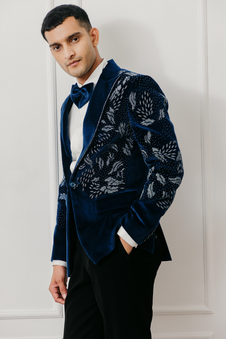 Teal velvet tuxedo with peak lapel and pearl embroidered front — bespoke by Clodor