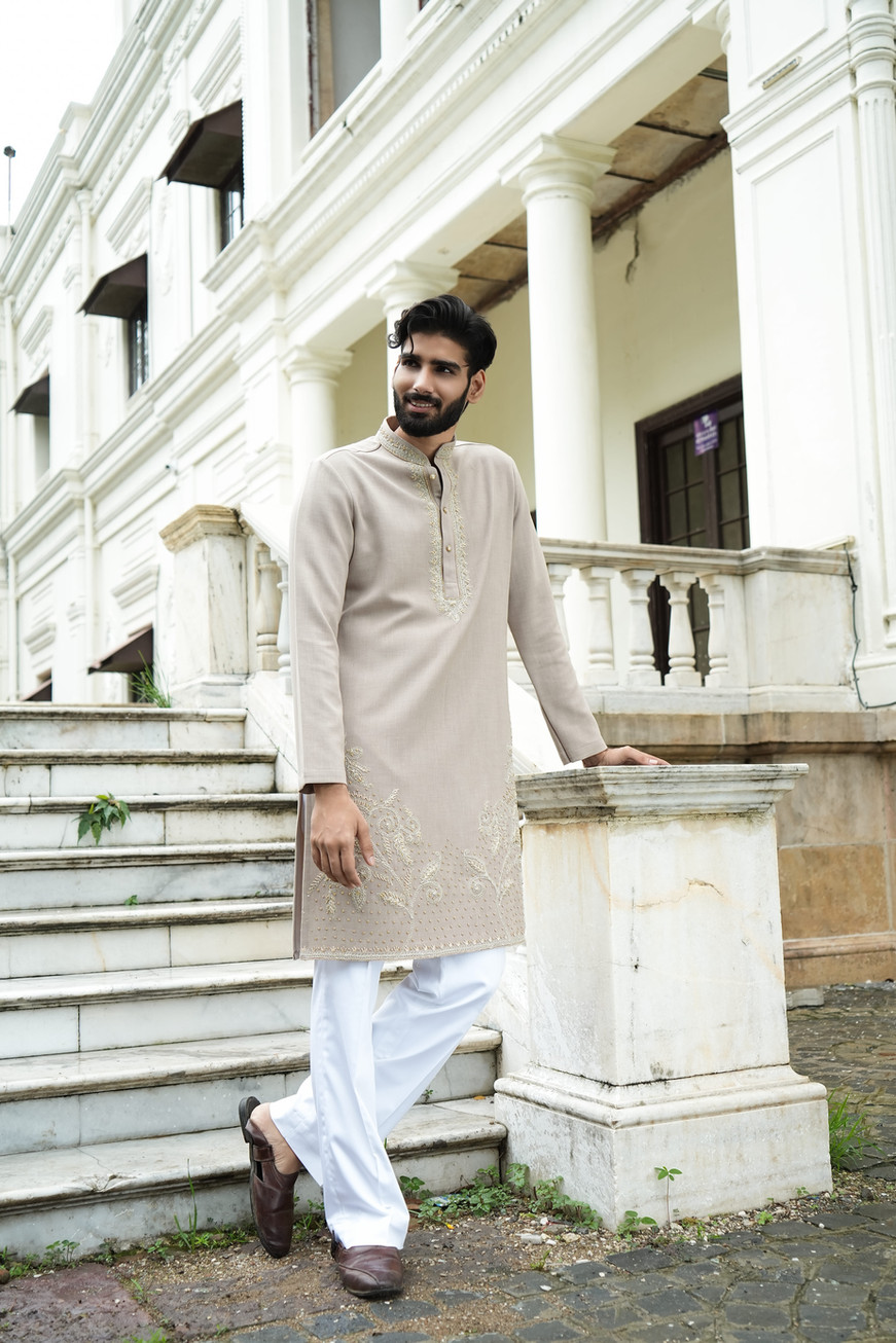 Intricate zari dabka and resham hand embroidery on neckline of taupe Tencel kurta – Clodor