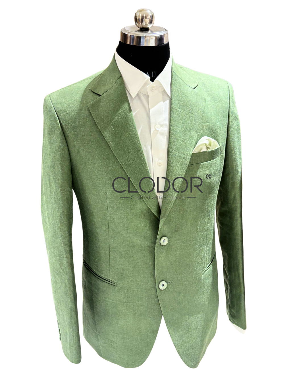 Close-up of Light Green Linen Suit showcasing notch lapel and bespoke tailoring details