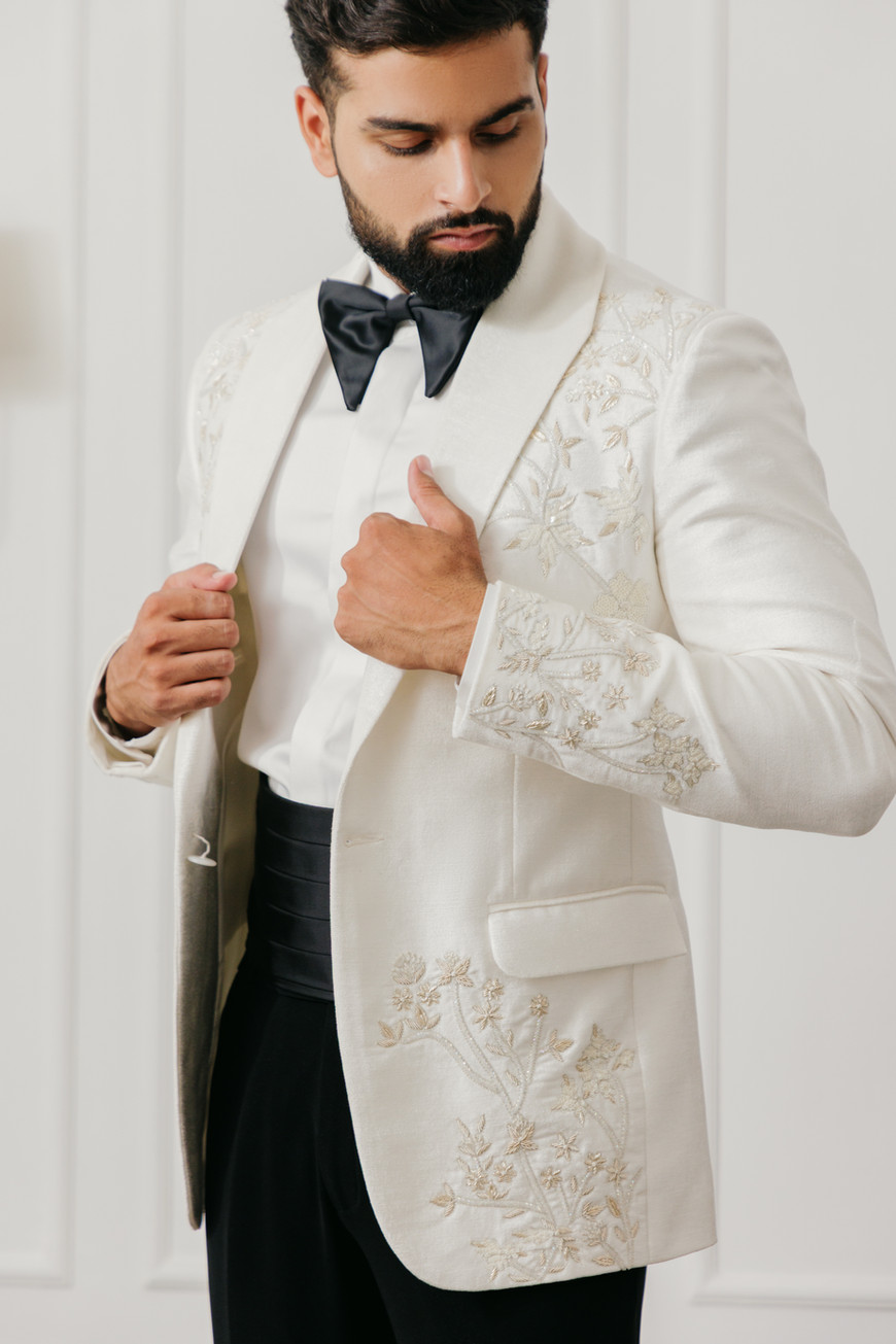 3. Ivory cotton silk velvet tuxedo jacket with embroidered sleeve detailing — bespoke by Clodor.