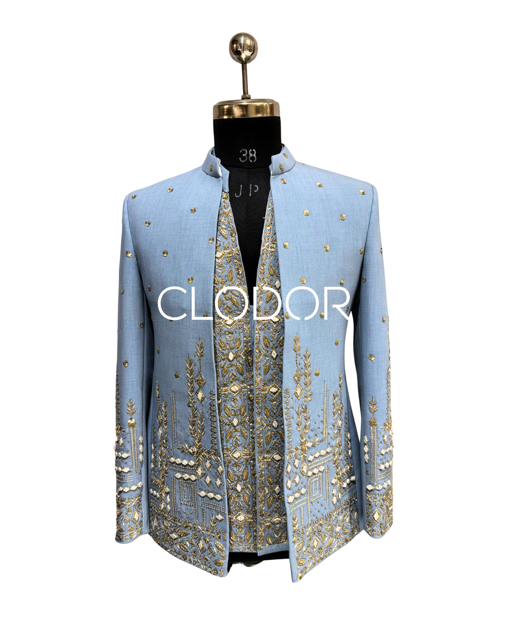 Intricate zardozi hand embroidery flowing across powder blue Tencel shrug surface – Clodo