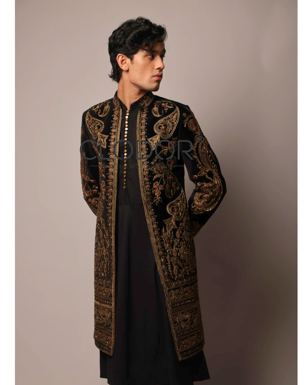 Heavy hand embroidery across front and back of black cotton velvet long shrug – Clodor