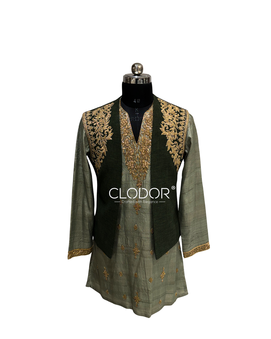 Dark green embroidered linen shrug layered over a Desi Tussar kurta