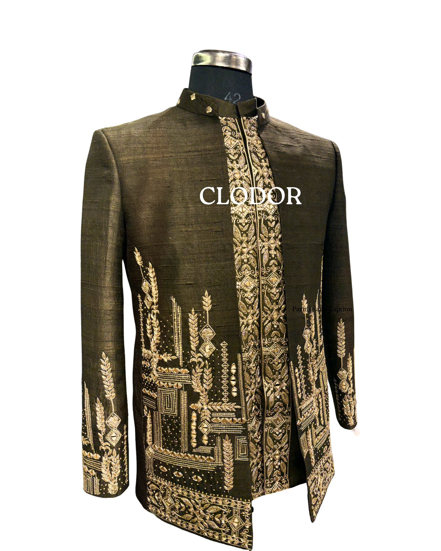 Intricate zardozi hand embroidery detail on dark green silk short shrug – Clodor