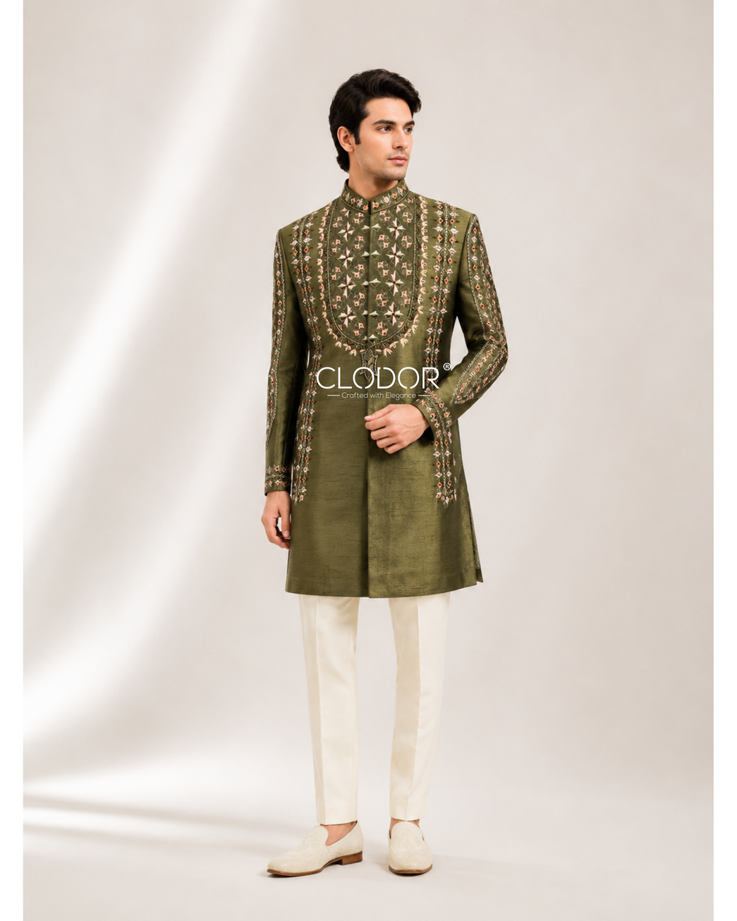Meadow Luxe green silk achkan for men in slub silk with resham hand embroidery