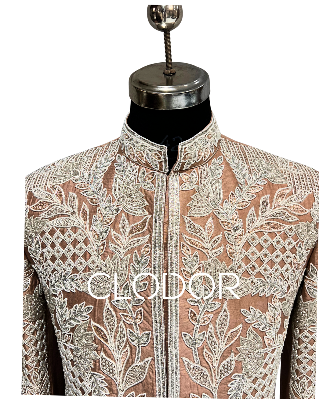 Intricate resham dori and pearl hand embroidery across entire surface of rose gold tusser sherwani