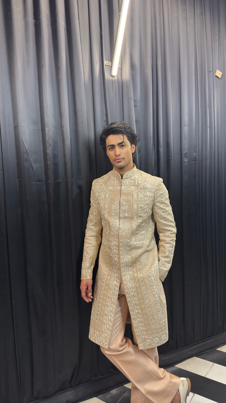 Rosé Aurore rose gold sherwani for groom in premium silk with intricate all-over embroidery