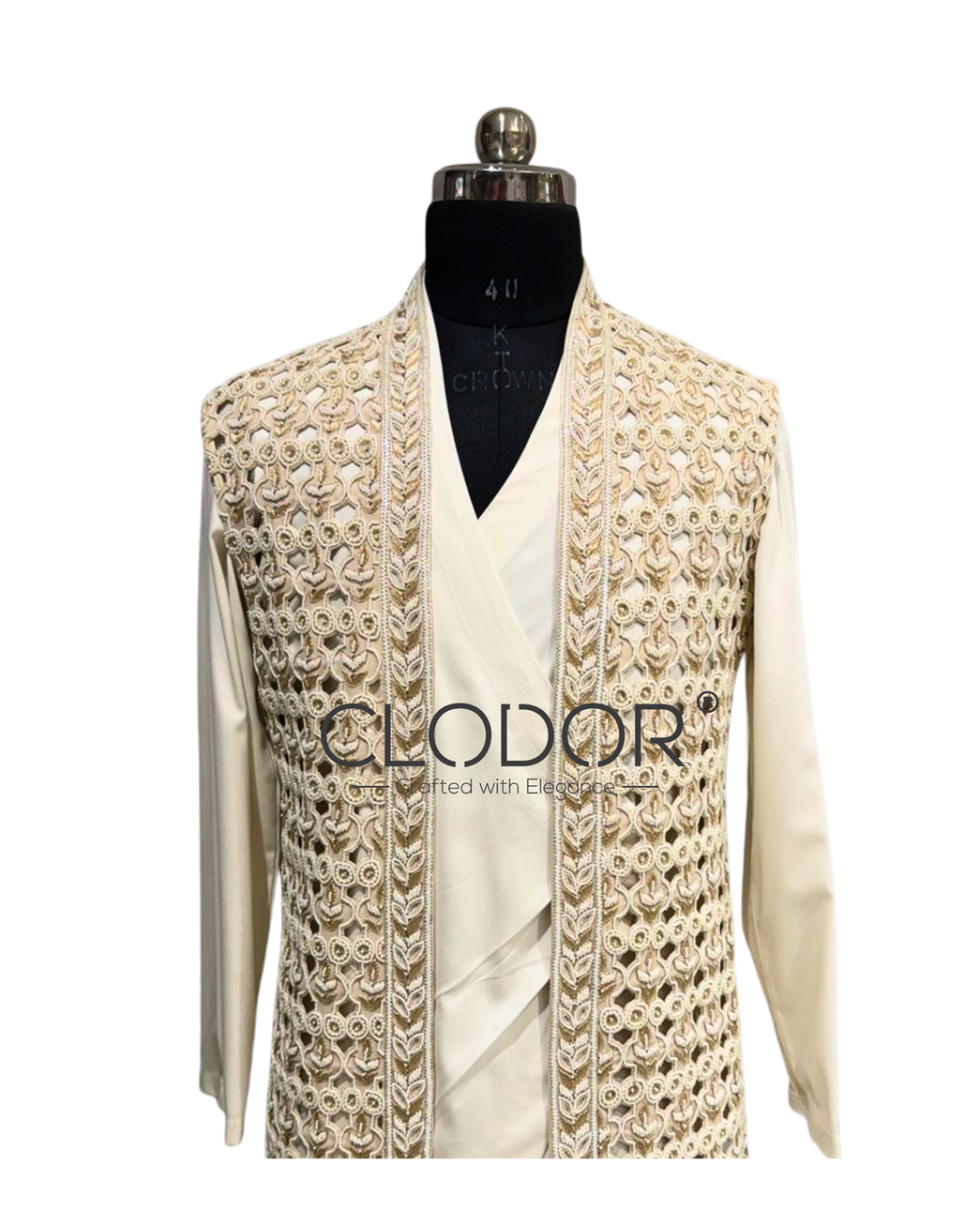 Ivory cutwork jacket featuring detailed craftsmanship and one-piece collar design