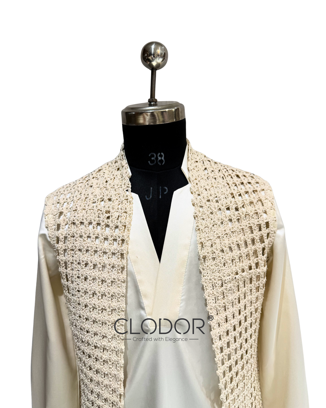Luxury ivory silk satin kurta set with machine embroidered cutwork shrug for destination weddings and festive occasions.
