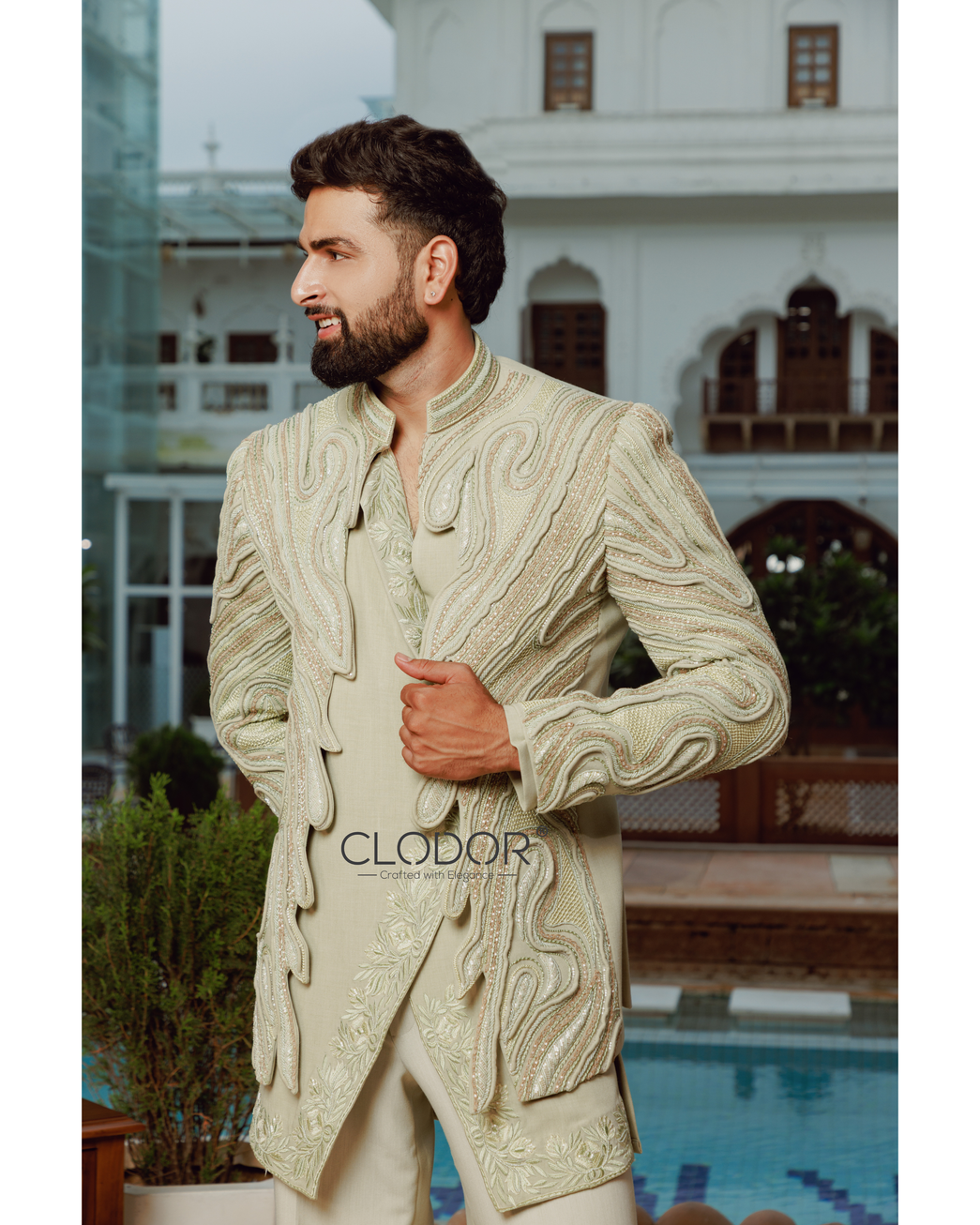 Light green Tencel embroidered shrug set with intricate hand cutwork — bespoke by Clodor.