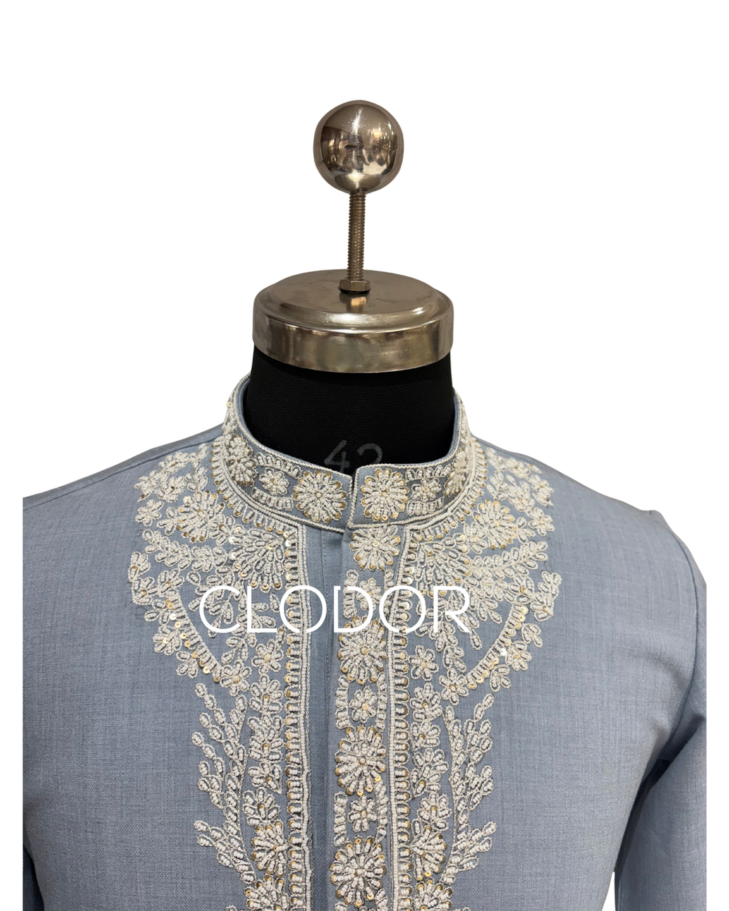 Delicate pearl hand embroidery detail on neckline of light blue tencel kurta