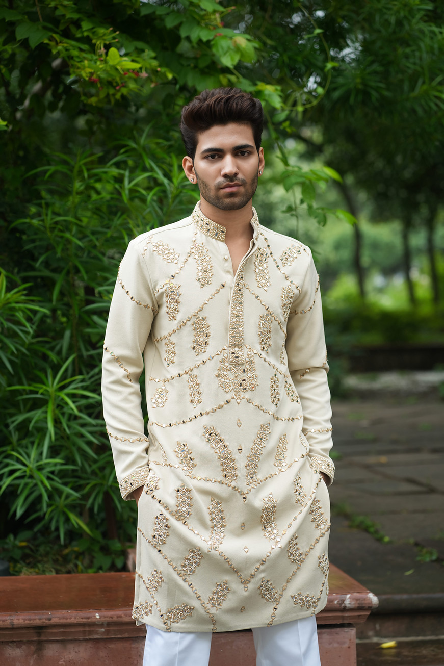 Heavy real mirror work and resham thread hand embroidery on light beige Tencel kurta