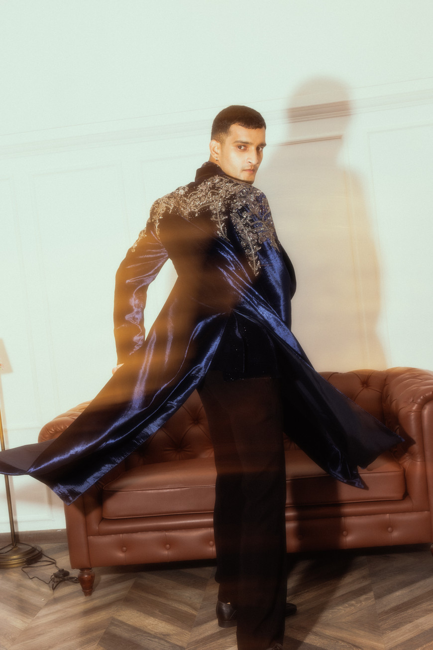 Royal blue velvet tail coat layered over embroidered tuxedo jacket — bespoke by Clodor.