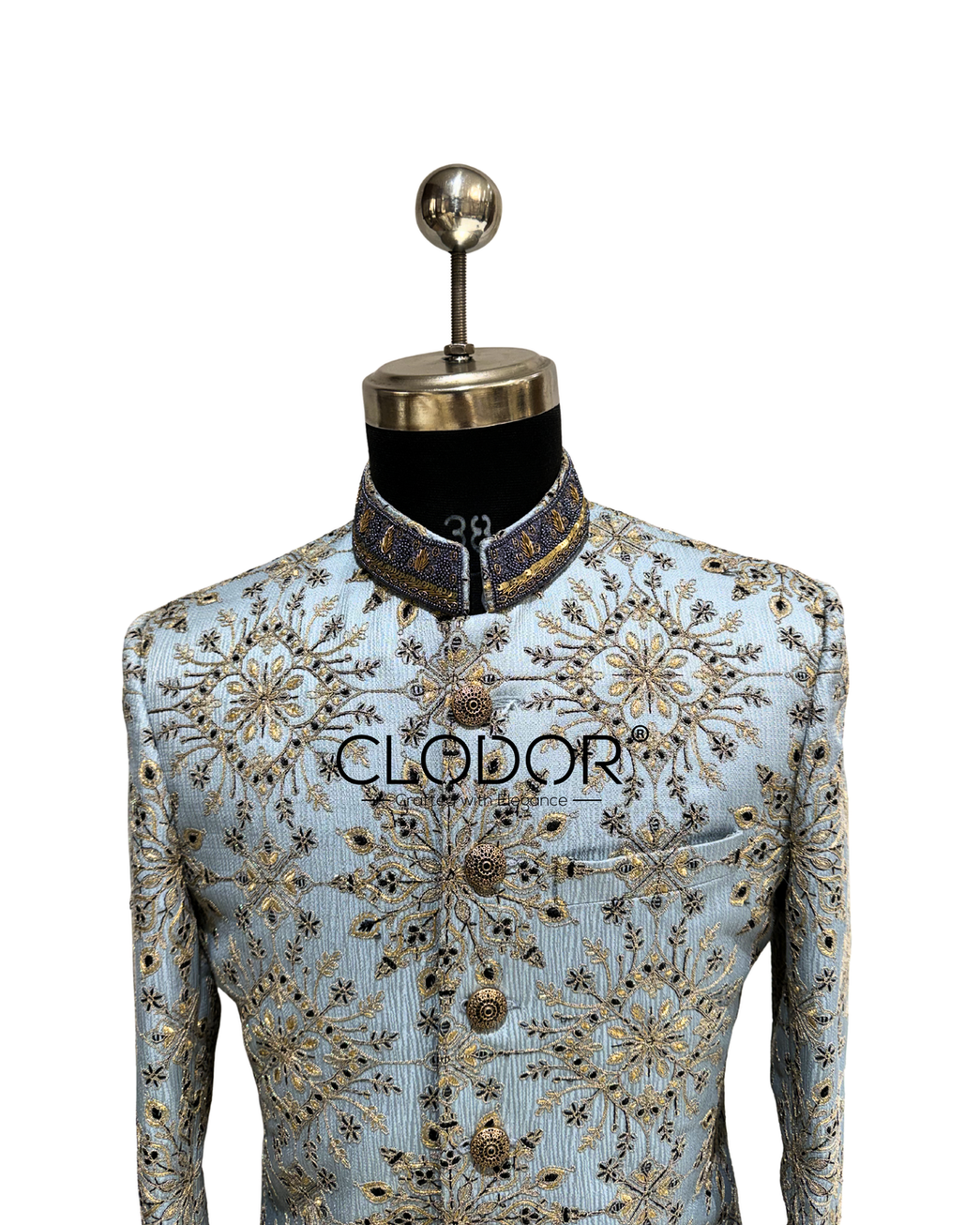Hand embroidery highlights on neckline of blue Banaras silk achkan set