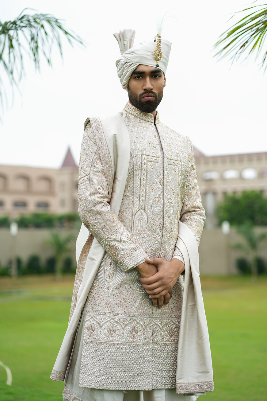 Rose Gold Imperial Dupion Silk Sherwani Ensemble for groom with frame embroidery and heavy handwork – bespoke by Clodor