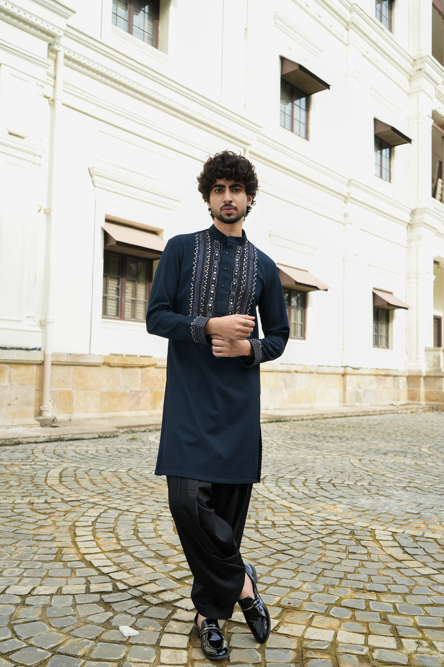 Neelraaz Teal Embroidered Kurta Ensemble for men with intricate hand embroidery on neckline and sleeve cuffs