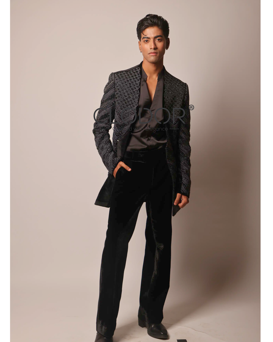 Sleek satin V-neck shirt layered under Noir Chevron Velvet Shrug Ensemble – Clodor