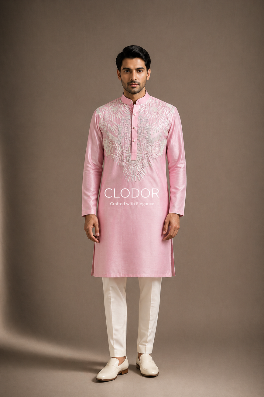 Full length blush pink kurta for men styled with off-white trousers