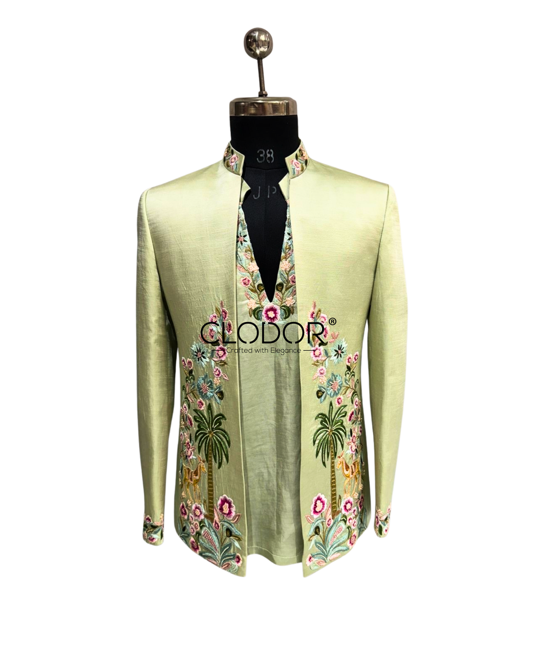 Light green linen satin short kurta with embroidered neckline and hem detailing