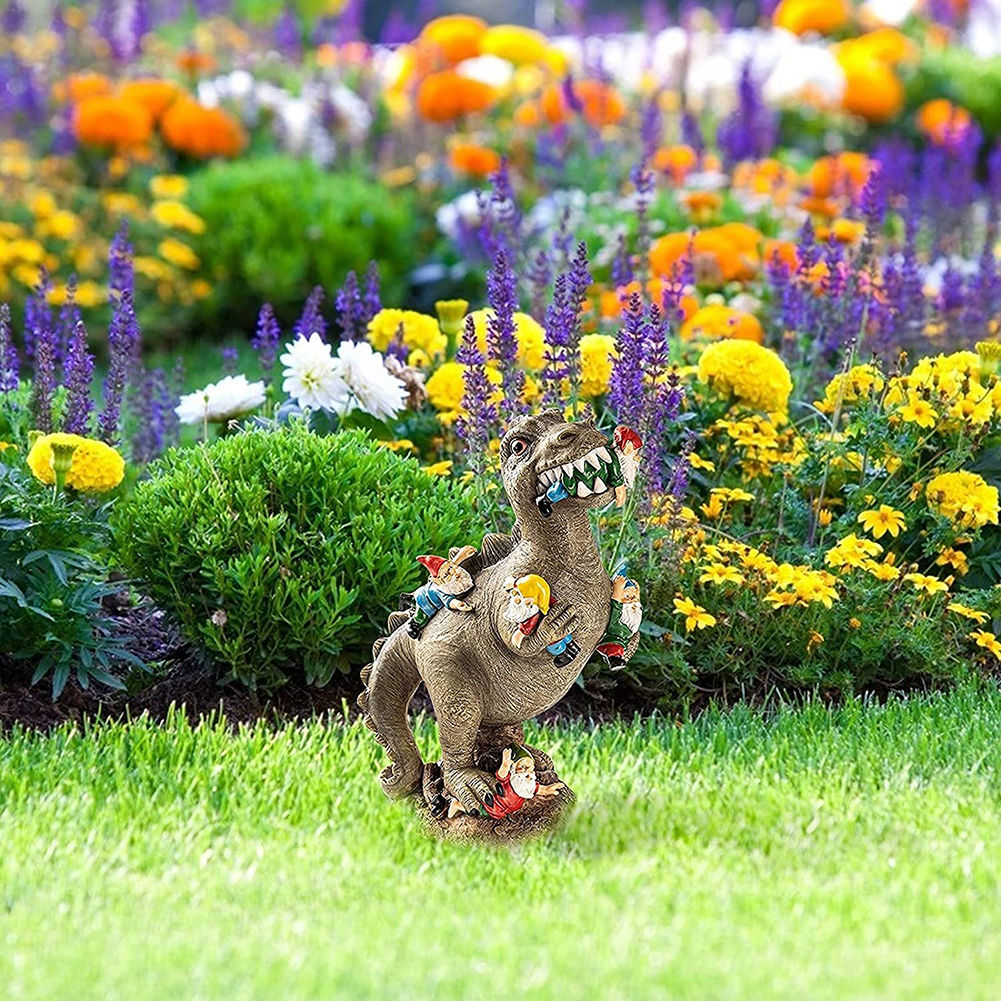 Funny Dinosaur Garden Statue displayed in a colorful flower garden