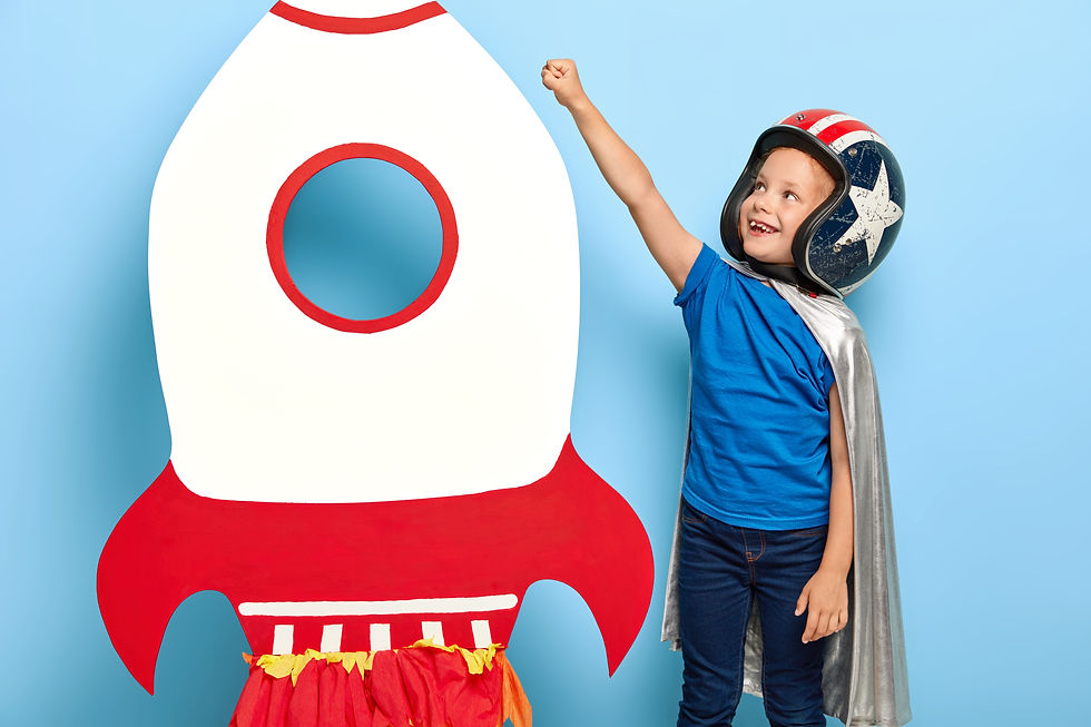 happy-child-raises-arm-near-paper-carton-toy-rocket-wants-fly-into-space.jpg