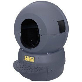 A gray globe sits on top of a computerized base as an original Litter Robot automatic litter box.