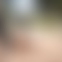 A softball player slides into home plate as the catcher reaches out, with dust flying in the air. Captured during the Conestoga vs. Humber College game, this action-packed shot showcases the intensity of the moment.