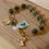 Thumbnail: Rosary Bracelet Oval - Peace and Tranquility- Single Decade - Connemara Marble full view 2