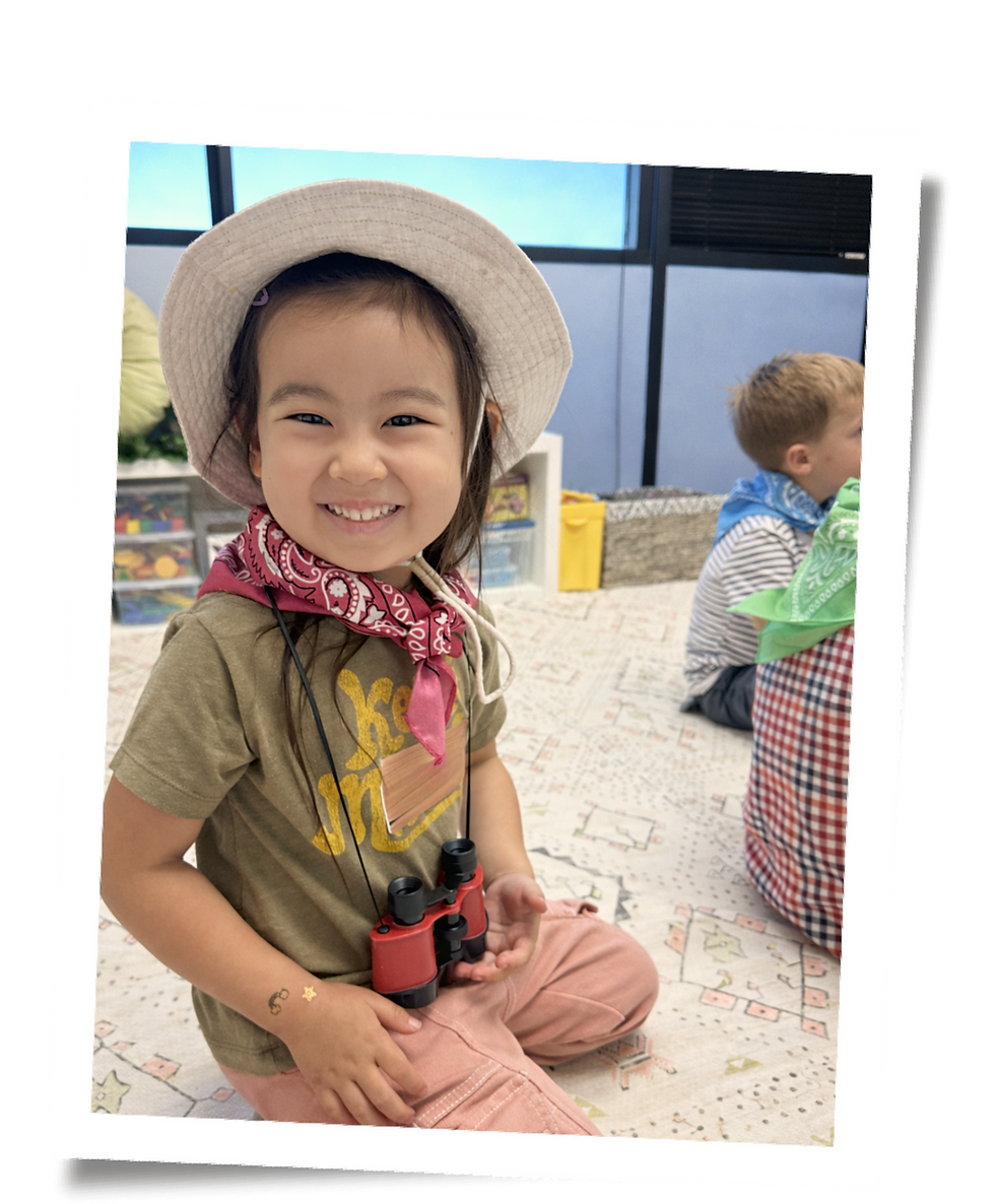 Student smiling during a learning camp