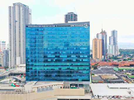 GH Tower by Ortigas Land in Greenhills, San Juan City—modern 15-storey green office tower with flexible, sustainable workspaces ideal for BPO, featuring direct access to Greenhills Mall, energy-efficient design, bike-friendly amenities, and seamless connectivity to Metro Manila’s key business districts.