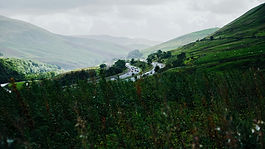 The M6 motorway in England, passing through lush green hills