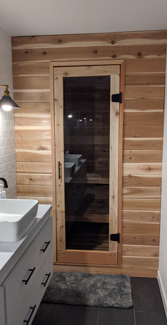 Custom cedar sauna built into master bathroom at vacation rental. 