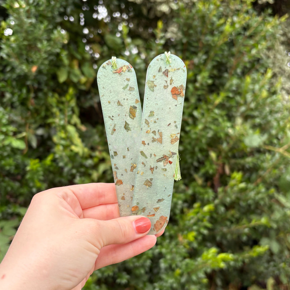 Handmade oval lime green resin bookmark with subtle rose petal leaf accents and tassel