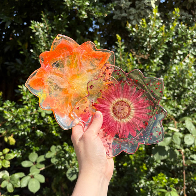 Handmade marbled resin dish in vibrant orange and yellow