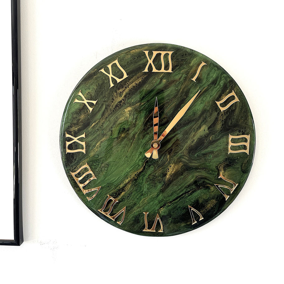 Green and black marble resin wall clock with gold accents and glossy finish, modern decorative home decor piece