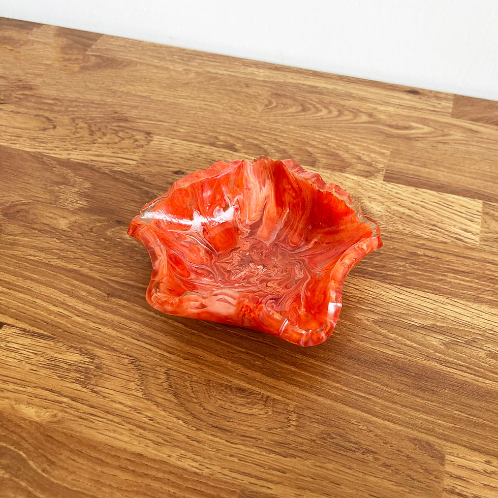 Solid orange marbled resin floral-shaped dish