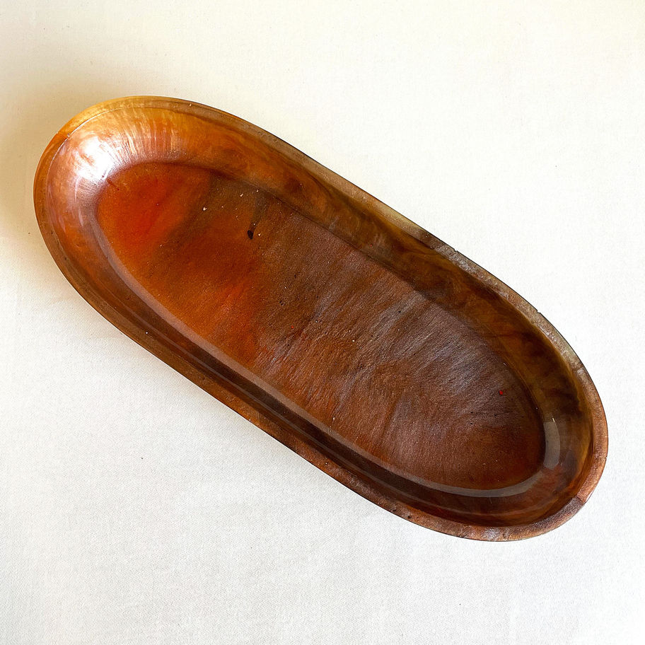 Large sculptural resin dish in brown, orange and cream for home decor