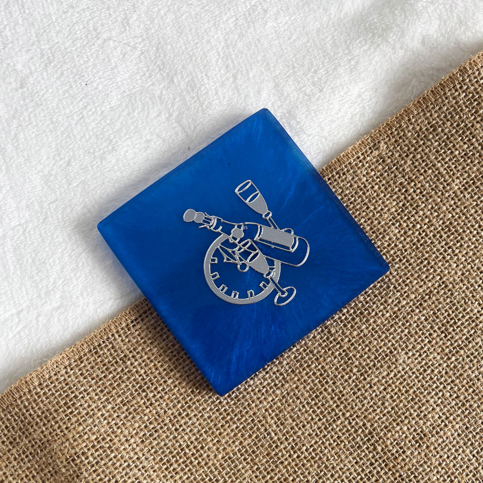 Square blue resin coaster with glossy finish and silver celebratory accents