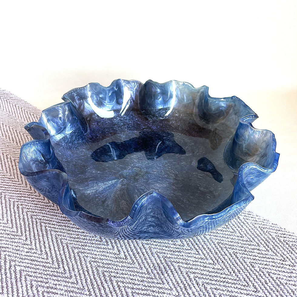Blue resin decorative bowl with glossy finish, modern home decor accent piece