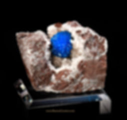 Cavansite on stilbite