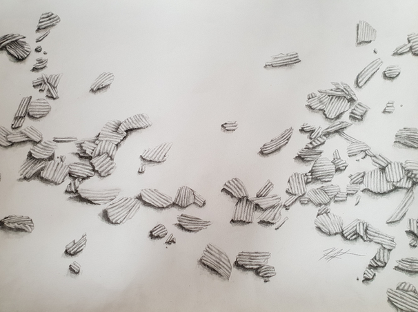 Crinkle cut chips spread across a surface
